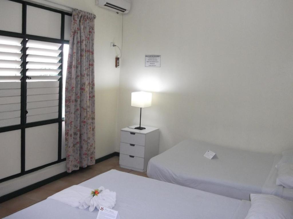 Studio 6 Apartments Сува Номер фото